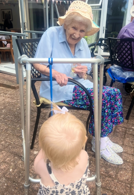 Salveo Care | One of our residents playing with a young relative