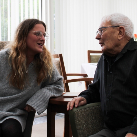 Salveo Care | One of our residents talking to our staff