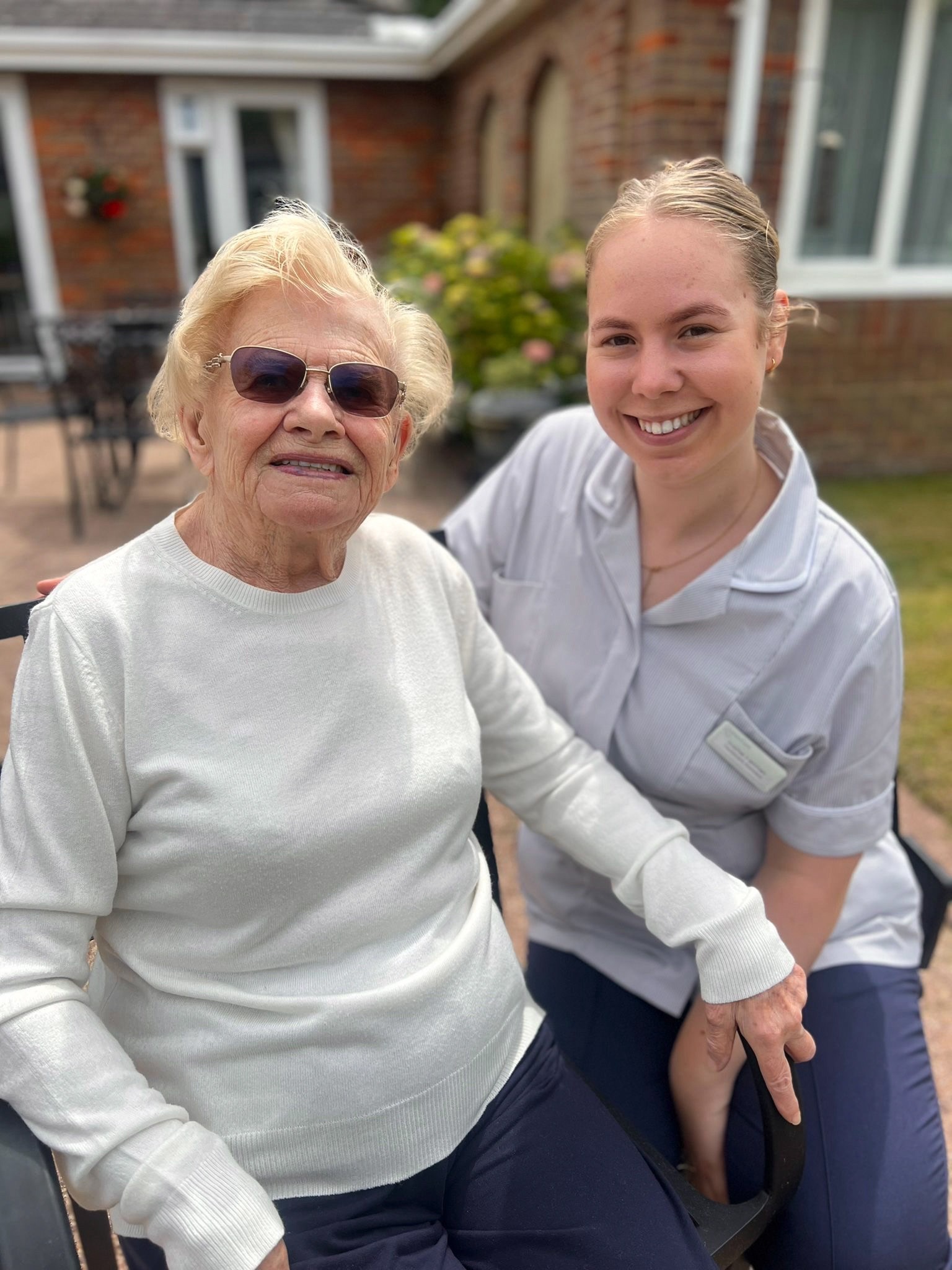 Salveo Care | An image of one of our residents with a member of our staff